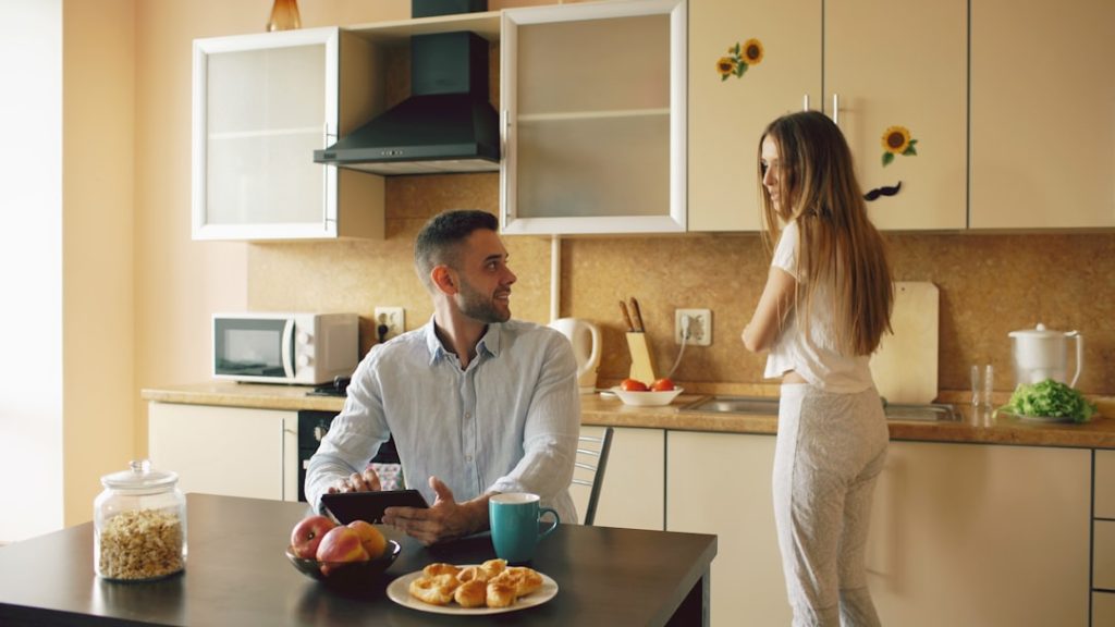 Couple having a calm money conversation at a table
