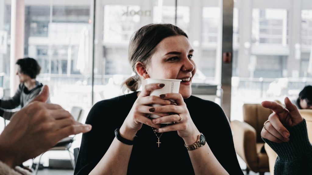 Friends having a serious conversation in a coffee shop